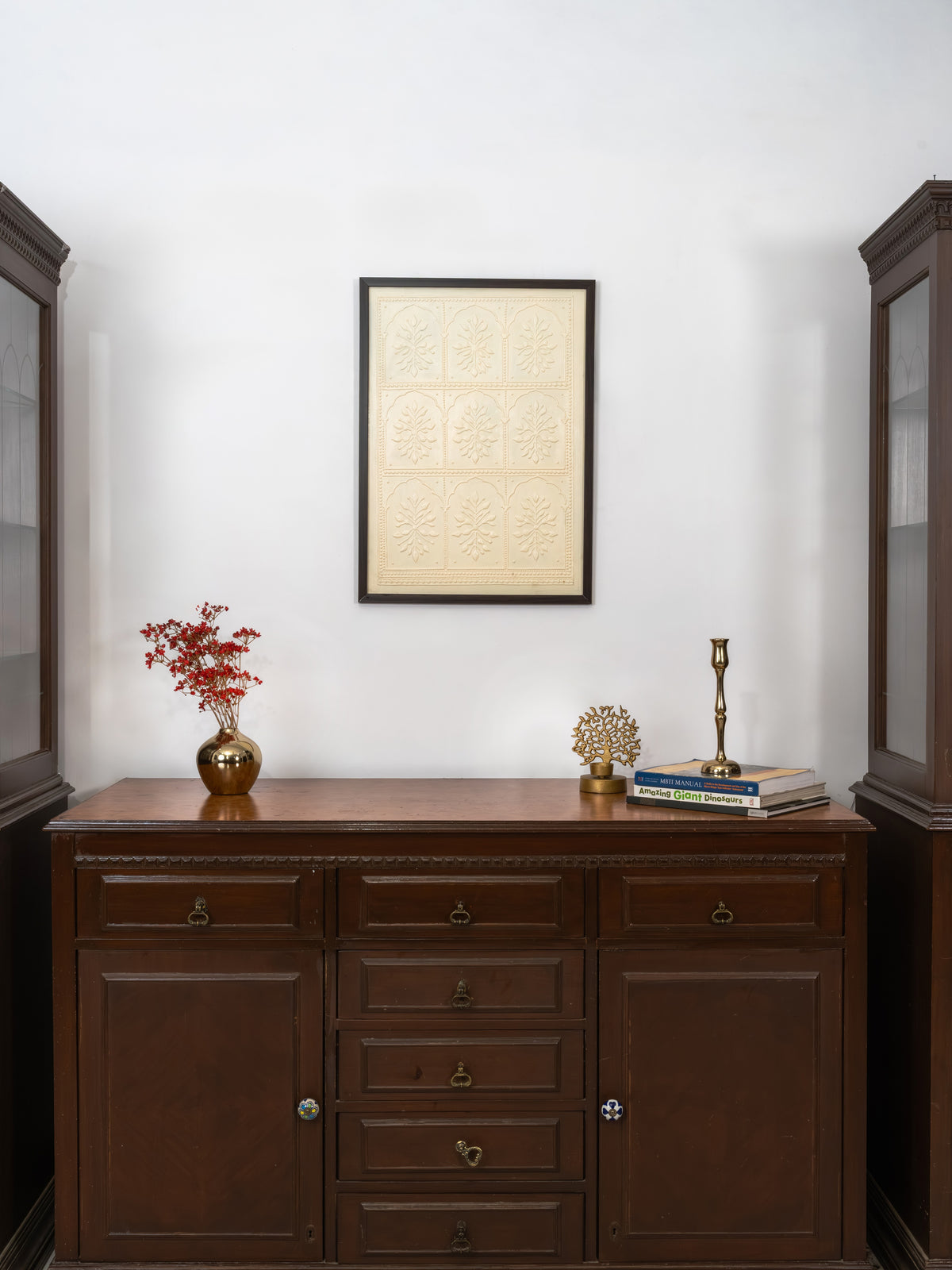 Tonal all-ivory Lippan relief where light and shadow carry the detail