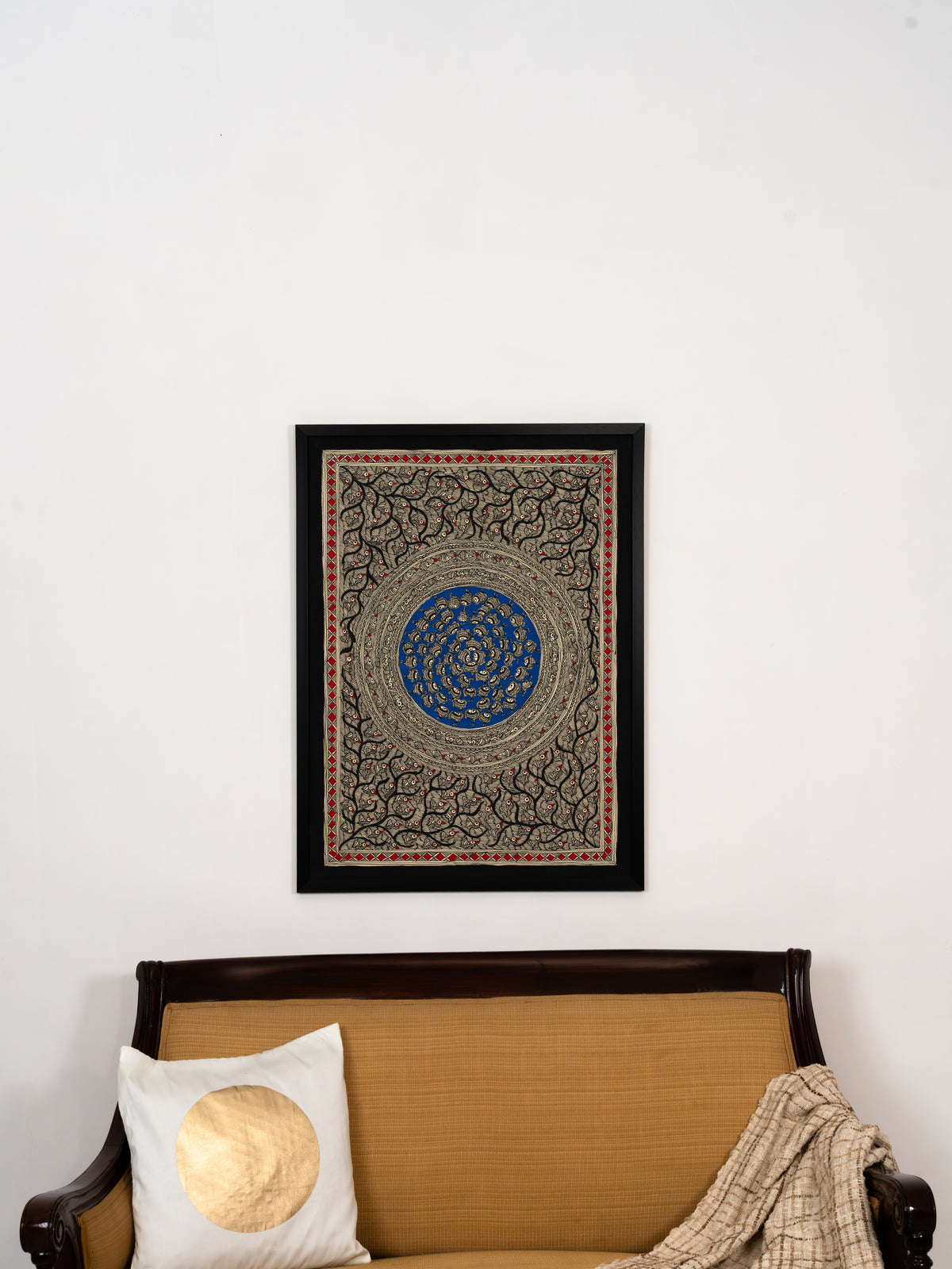 Hand-painted Mithila fish motifs drawn in dense Madhubani linework