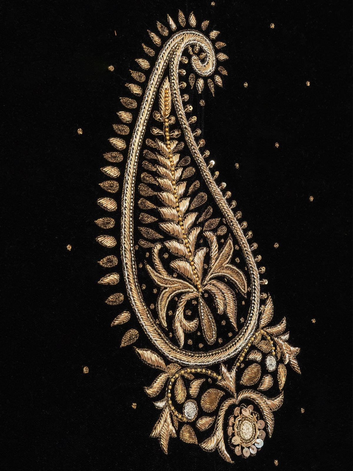 Detail of raised gold zari work in Noor Paisley