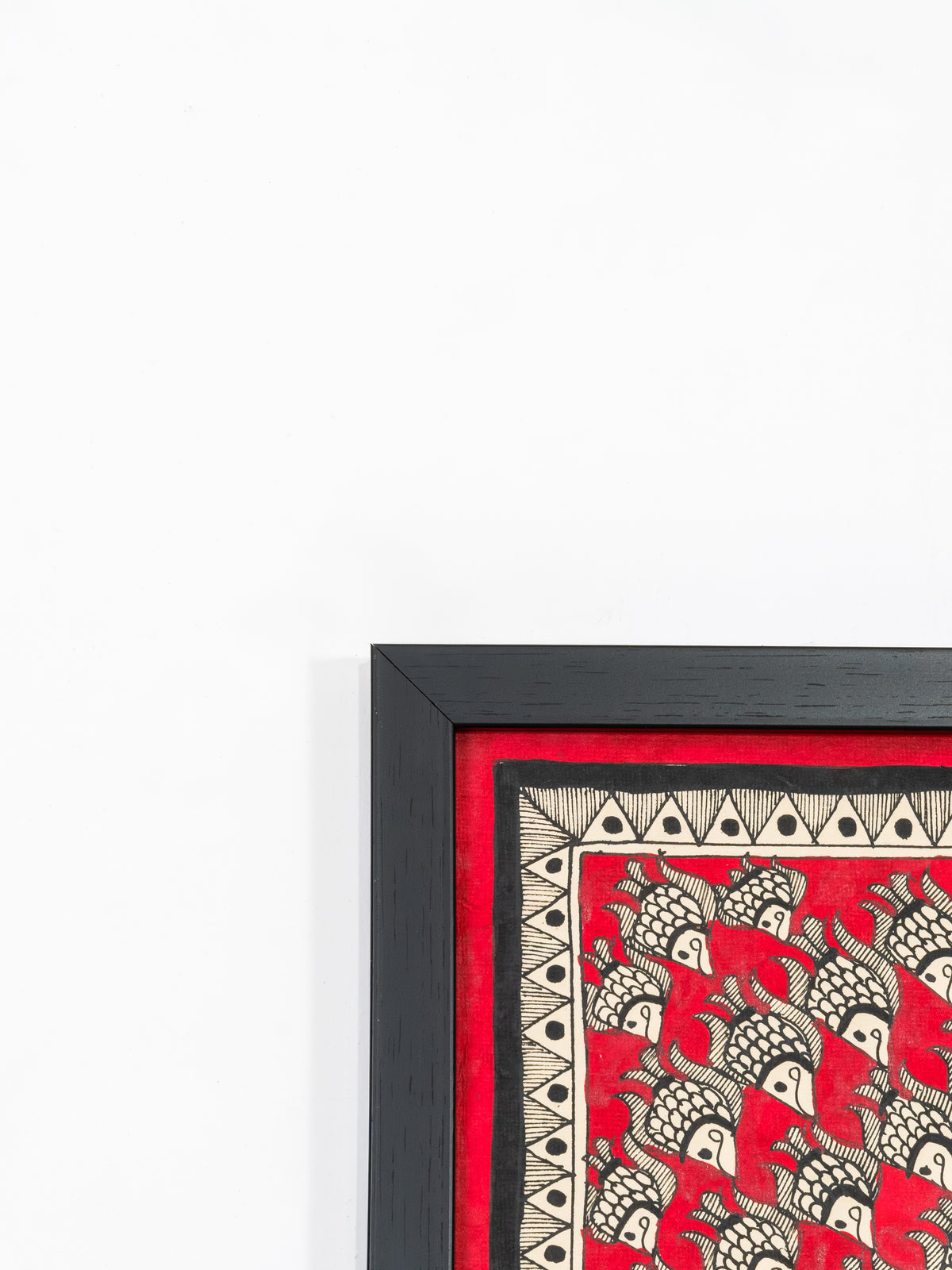 Hand-painted Madhubani mandala for a warm, jewel-toned interior